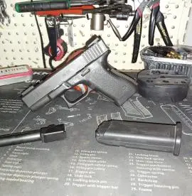 Glock 23, Gen 2, with extra threaded barrel in 9mm